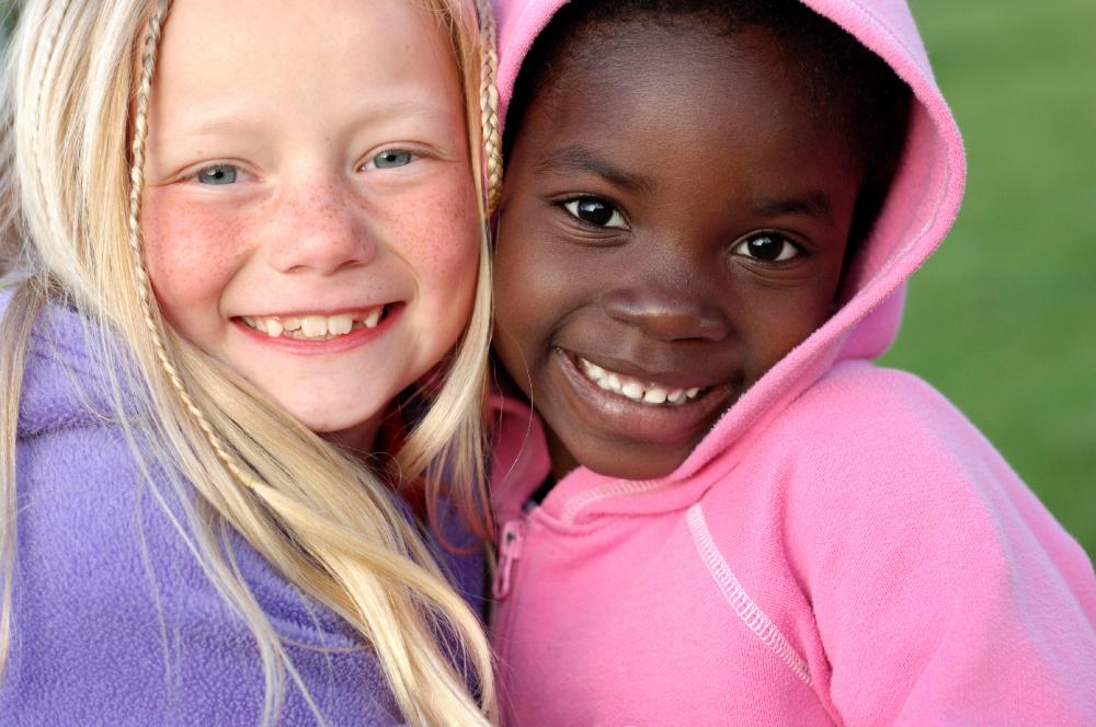 young girls smiling | pediatric dentistry dumbo